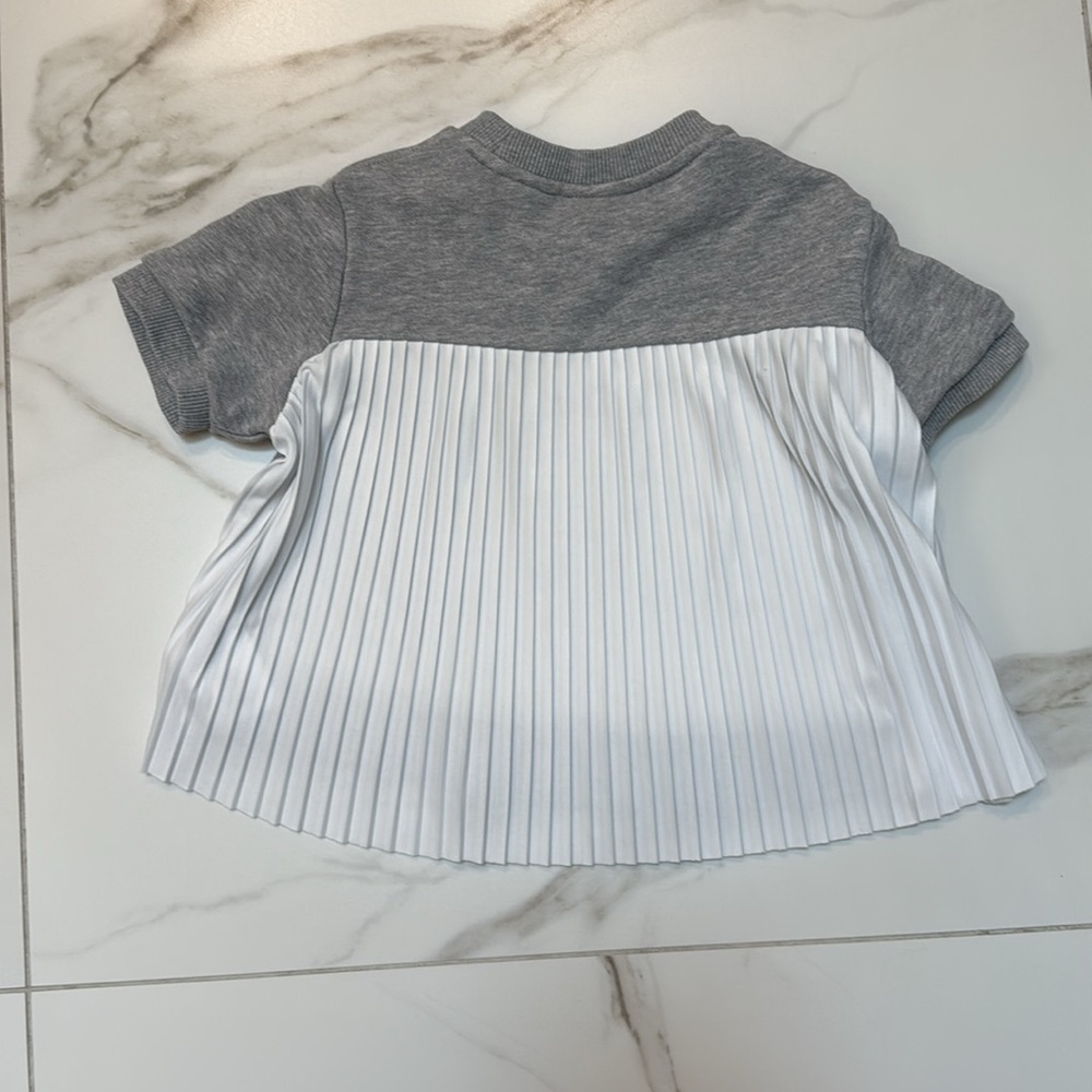 Girls Lacoste crew sweatshirt with pleated back. - Picture 2 of 5